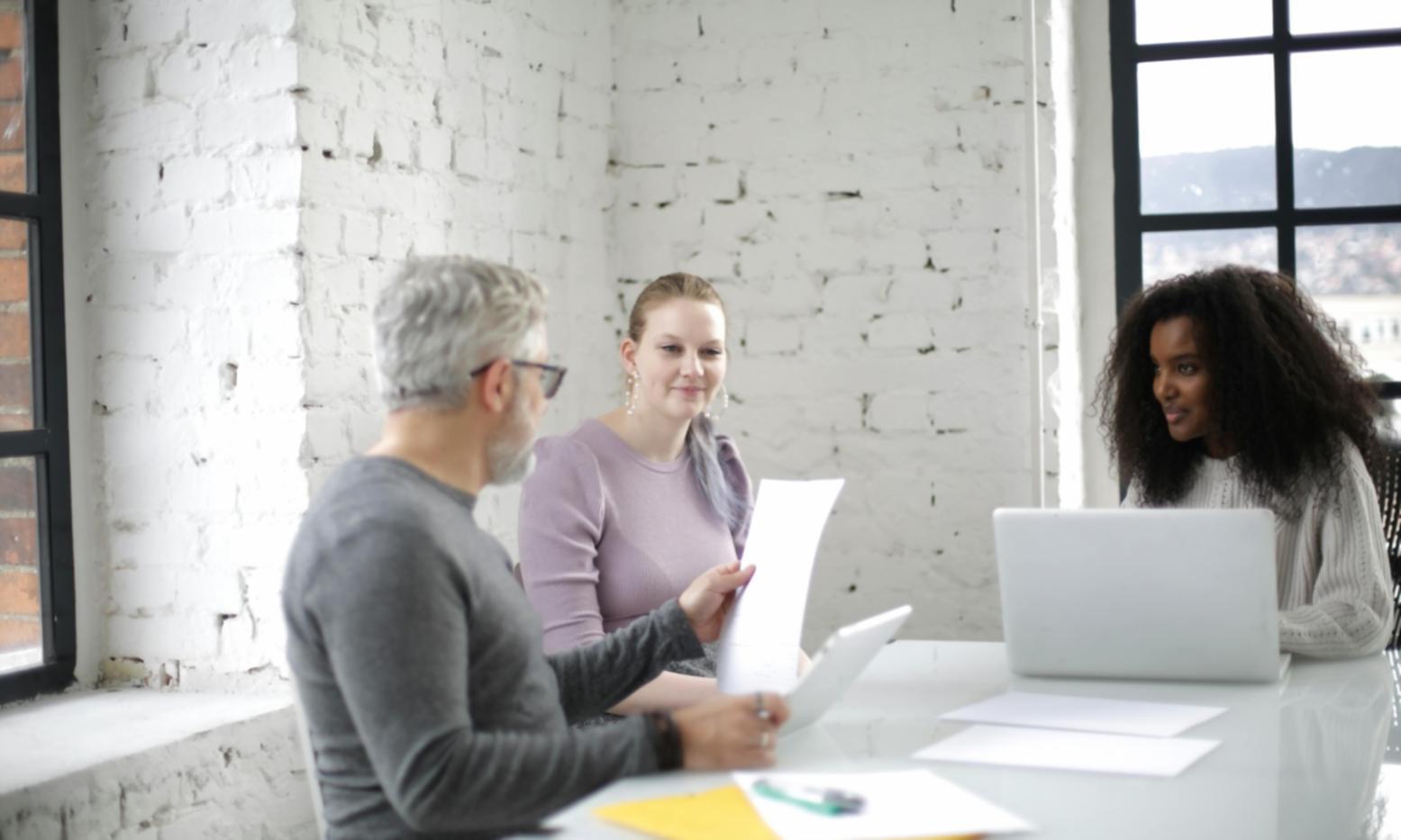 Professional collaboration environment demonstrating effective team coordination methods